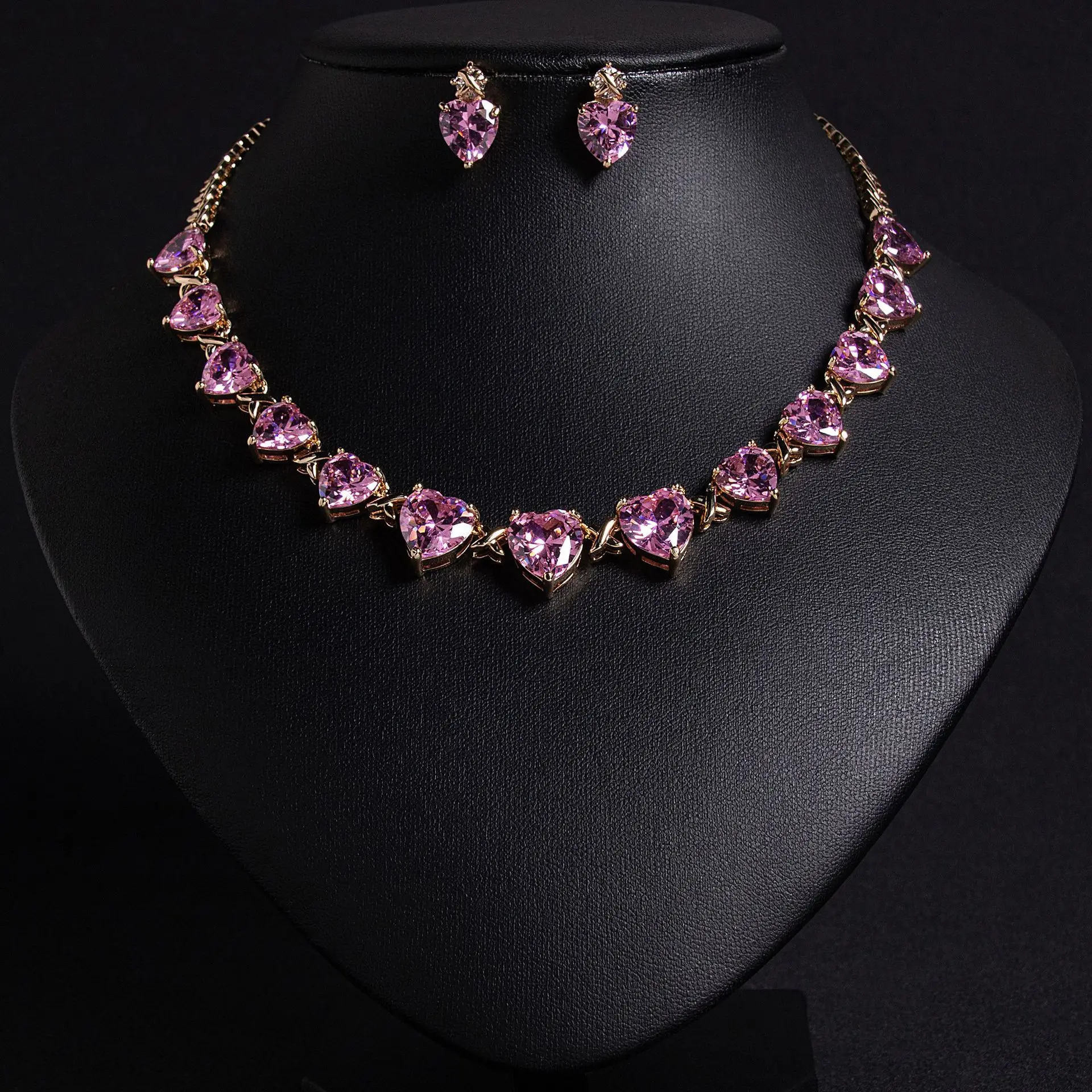 European and American silver needle niche new pink love gem pendant earrings necklace women's high-end design jewelry wholesale
European and American silver needle niche new pink love gem pendant earrings necklace women's high-end design jewelry wholesale