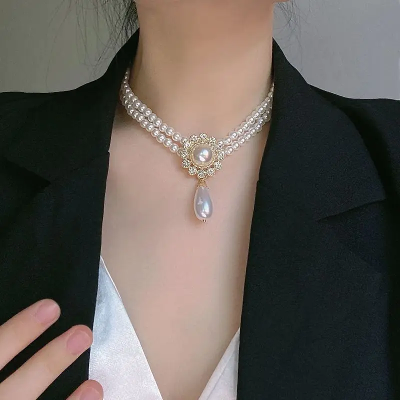 Vintage light luxury inlaid crystal double-layer pearl necklace Hepburn elegant temperament collarbone chain banquet dress
Vintage light luxury inlaid crystal double-layer pearl necklace Hepburn elegant temperament collarbone chain banquet dress
