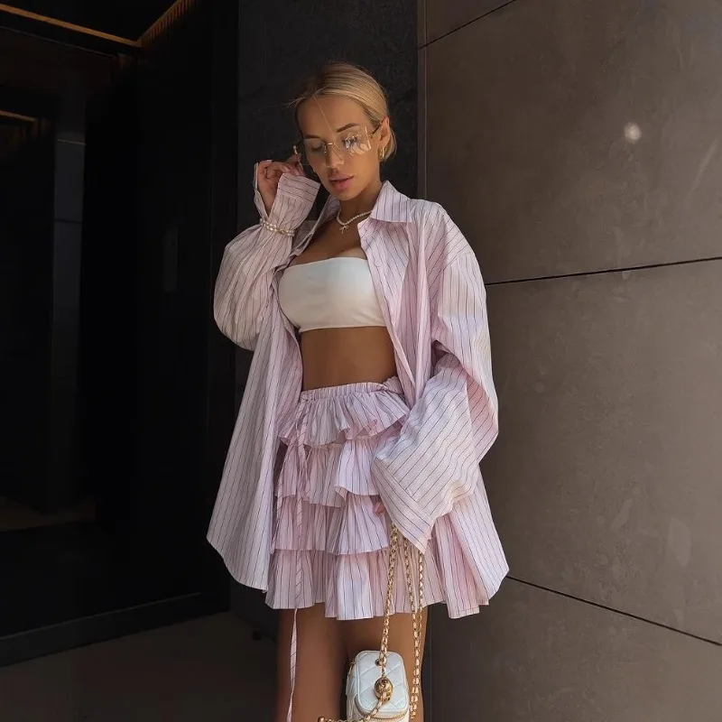 European and American Summer Fashion Pink Striped Cardigan Two-piece Set Simple and Casual Shirt Cake Short Skirt Two-piece Set
European and American Summer Fashion Pink Striped Cardigan Two-piece Set Simple and Casual Shirt Cake Short Skirt Two-piece Set
