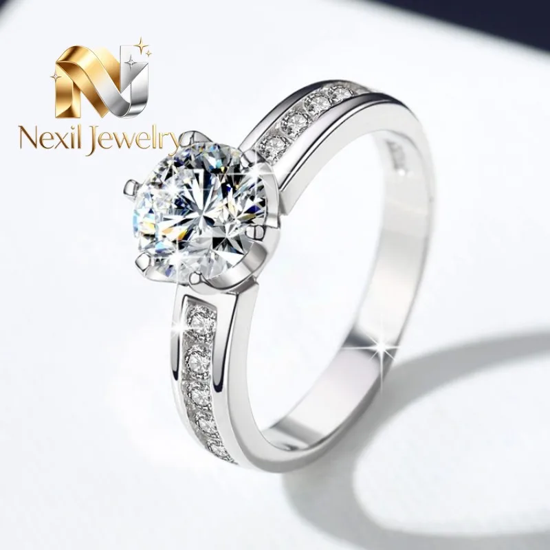 Nexil Jewelry Nexil Jewelry Six-Prong Crown Ring Women's 1CT Moissanite PT950 Platinum - Firm six-prong setting, 1CT brillian
Nexil Jewelry Nexil Jewelry Six-Prong Crown Ring Women's 1CT Moissanite PT950 Platinum - Firm six-prong setting, 1CT brillian