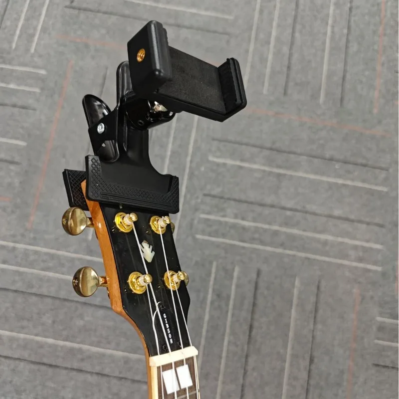 Guitar Phone Holder Thumb Piano Guitar Phone Clamp Rotatable Stand
Guitar Phone Holder Thumb Piano Guitar Phone Clamp Rotatable Stand