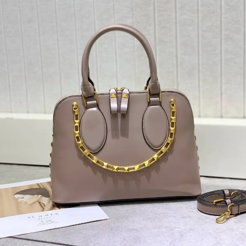 2025 Luxury Fashionable Versatile Rivet Handbag Women Shape Bag Shoulder Crossbody Bag Brand Design Tote Bag New Messenger Bag
2025 Luxury Fashionable Versatile Rivet Handbag Women Shape Bag Shoulder Crossbody Bag Brand Design Tote Bag New Messenger Bag