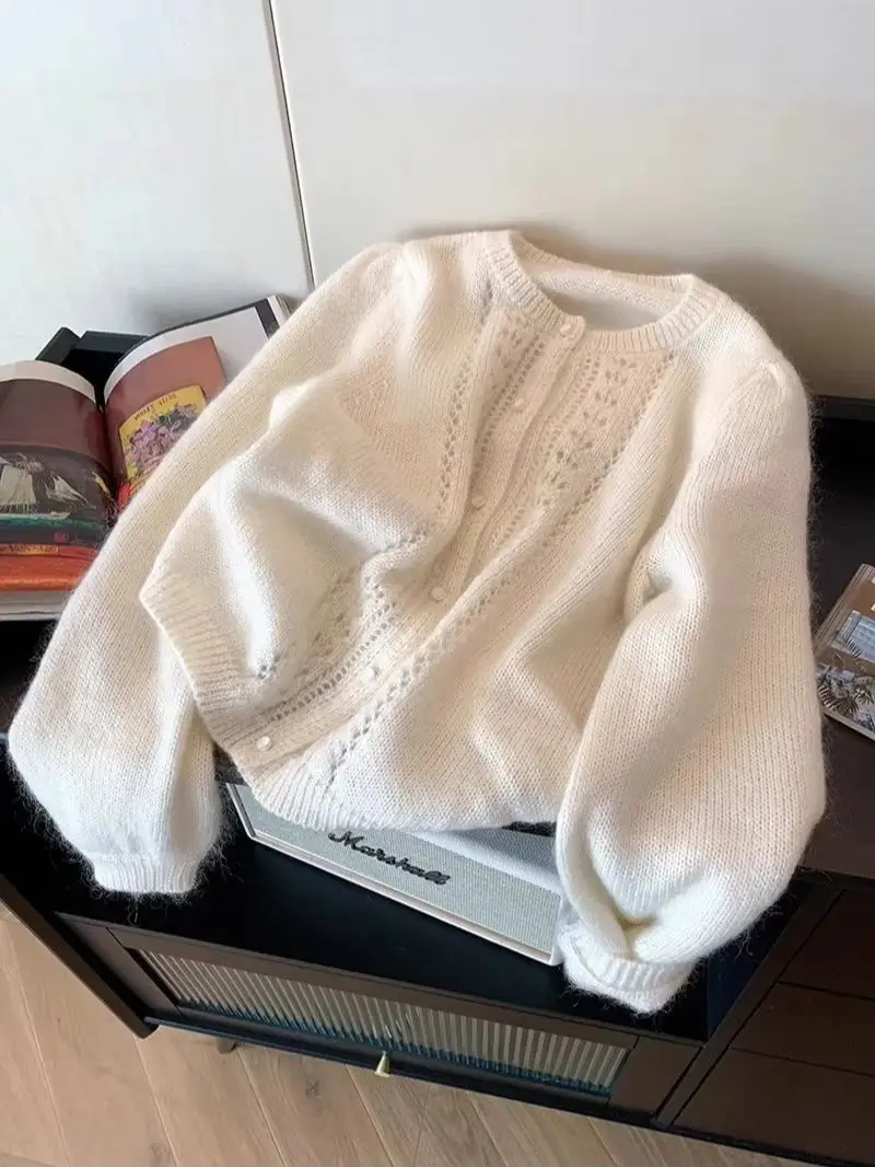 Elegant Hollow Out O-neck Sweater Soft Short Knitted Cardigan Women's Spring Autumn 2025 New Korean Long Sleeved Jacket
Elegant Hollow Out O-neck Sweater Soft Short Knitted Cardigan Women's Spring Autumn 2025 New Korean Long Sleeved Jacket