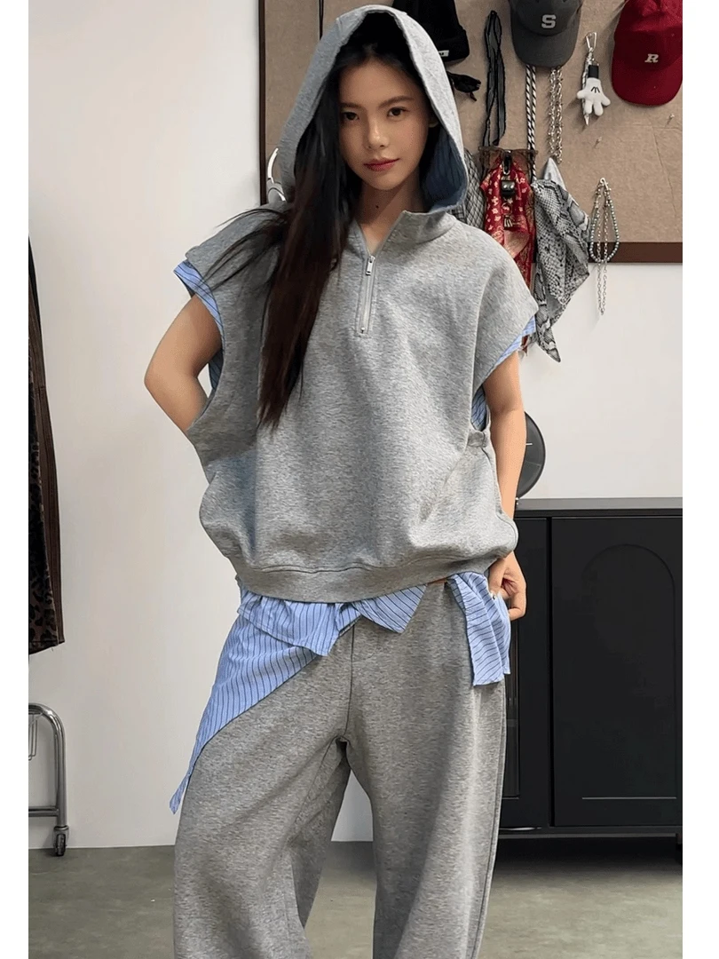 Повседневный комплект с капюшоном и свободными брюками для женщин, модный лоскутный дизайн, удобная смесь хлопка и полиэстера
Повседневный комплект с капюшоном и свободными брюками для женщин, модный лоскутный дизайн, удобная смесь хлопка и полиэстера