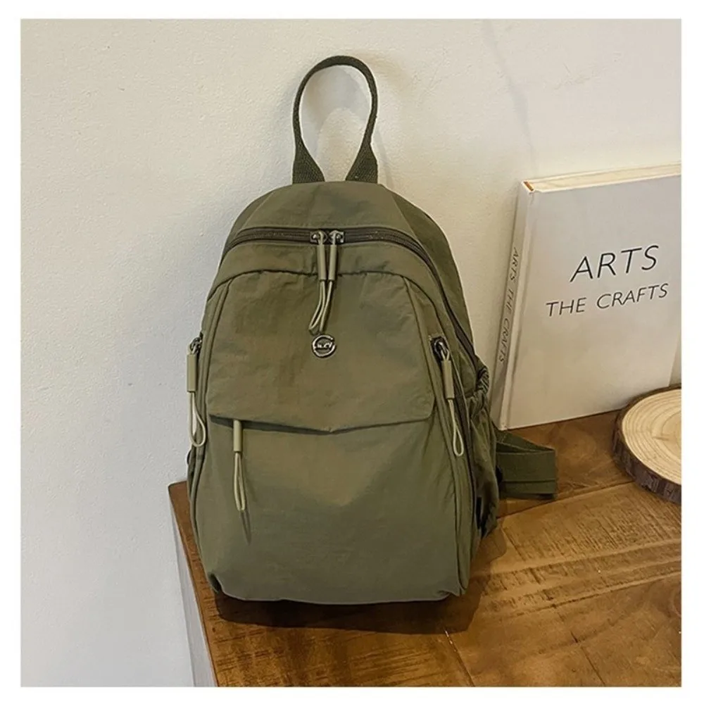 Solid Color Oxford Fabric Backpack Light Weight Nylon Casual Crossbody Bag Large Capacity Adjustable Strap
Solid Color Oxford Fabric Backpack Light Weight Nylon Casual Crossbody Bag Large Capacity Adjustable Strap