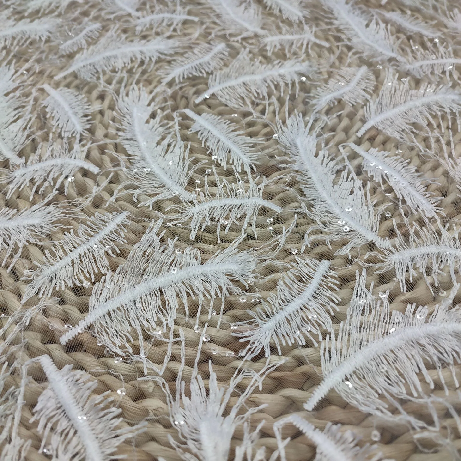 New 3D feather sequin lace fabric, embroidered wedding dress, curtain sewing accessories
New 3D feather sequin lace fabric, embroidered wedding dress, curtain sewing accessories
