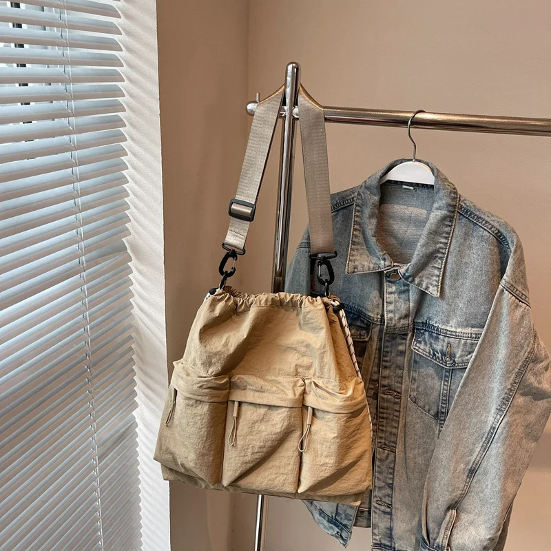 Women's Bag New Large Capacity Lazy Tote Bag Korean Style Drawstring College Student Commuter Shoulder Crossbody Bag
Women's Bag New Large Capacity Lazy Tote Bag Korean Style Drawstring College Student Commuter Shoulder Crossbody Bag