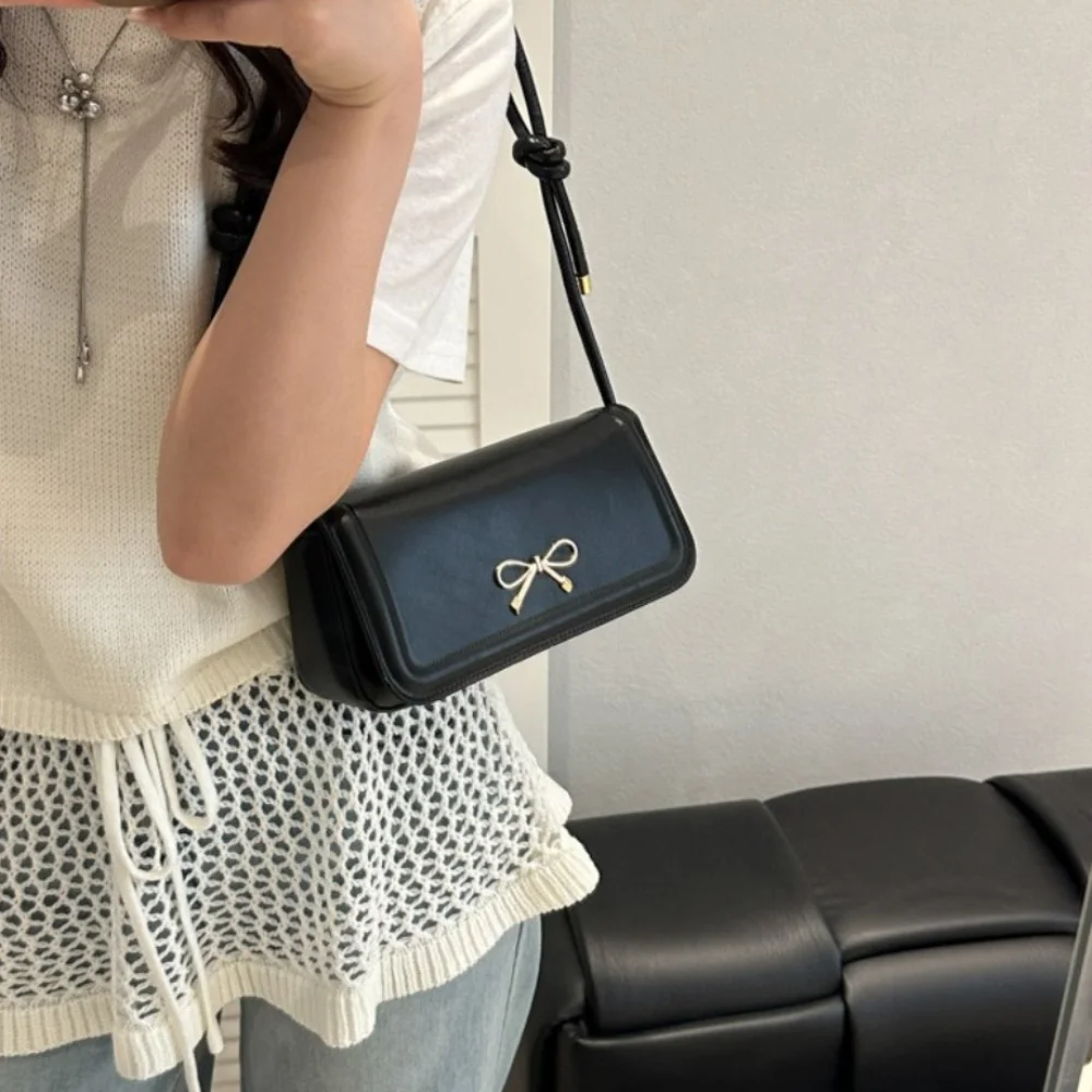 Portable Solid Color Bowknot Shoulder Bag PU Leather Square Bow Crossbody Bag Sweet Leisure Armpit Bag Female
Portable Solid Color Bowknot Shoulder Bag PU Leather Square Bow Crossbody Bag Sweet Leisure Armpit Bag Female
