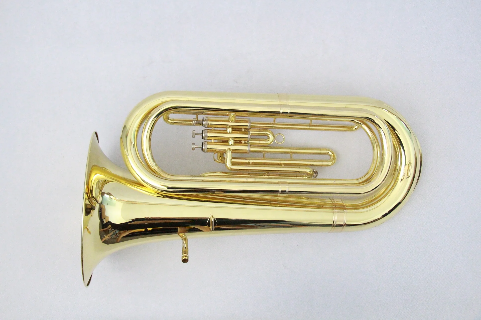 Hooqu Cheapest Factory Price Gold Lacquer Tone Bb Three Piston Tuba Brass Body Music Instruments Tuba
Hooqu Cheapest Factory Price Gold Lacquer Tone Bb Three Piston Tuba Brass Body Music Instruments Tuba