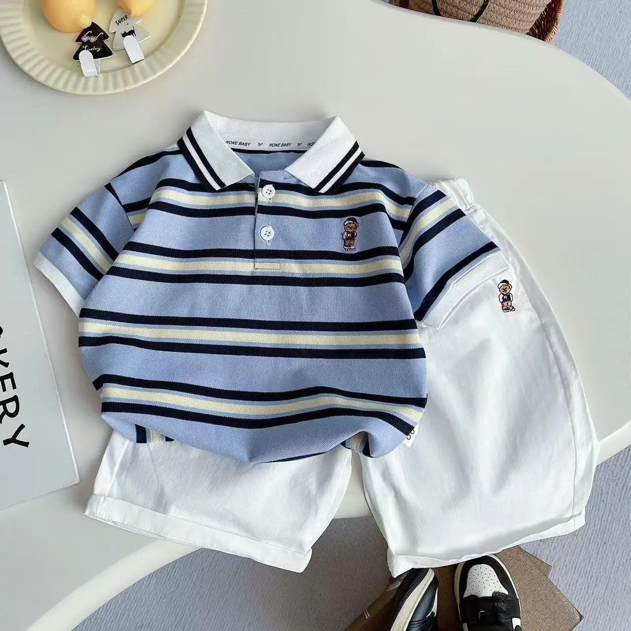 Boys' Summer Set Fashion Striped Polo Shirt+White Casual Shorts Two Piece Set Baby Clothing
Boys' Summer Set Fashion Striped Polo Shirt+White Casual Shorts Two Piece Set Baby Clothing
