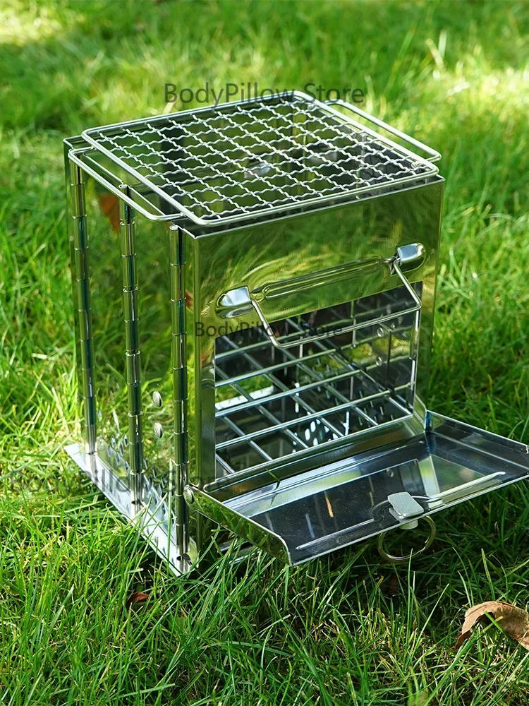 Outdoor folding wood stove Stainless steel grill integrated fire heating BBQ Grill charcoal Camping accessories
Outdoor folding wood stove Stainless steel grill integrated fire heating BBQ Grill charcoal Camping accessories