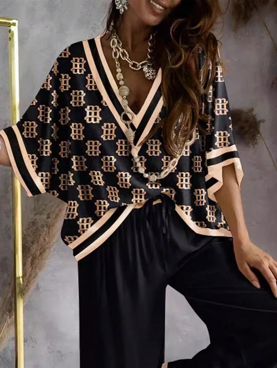 2pcs Women Printed Dolman Sleeve V-Neck Top And Wide Leg Pants Loungewear Set
2pcs Women Printed Dolman Sleeve V-Neck Top And Wide Leg Pants Loungewear Set