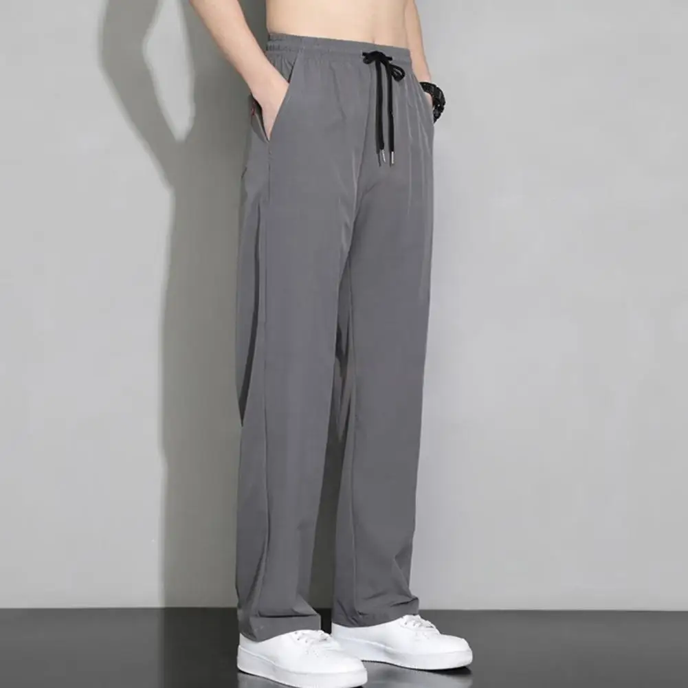 Men Trousers Solid Color Men Pants Quick-drying Men's Sport Pants with Side Pockets Drawstring Waist for Gym Training Jogging
Men Trousers Solid Color Men Pants Quick-drying Men's Sport Pants with Side Pockets Drawstring Waist for Gym Training Jogging