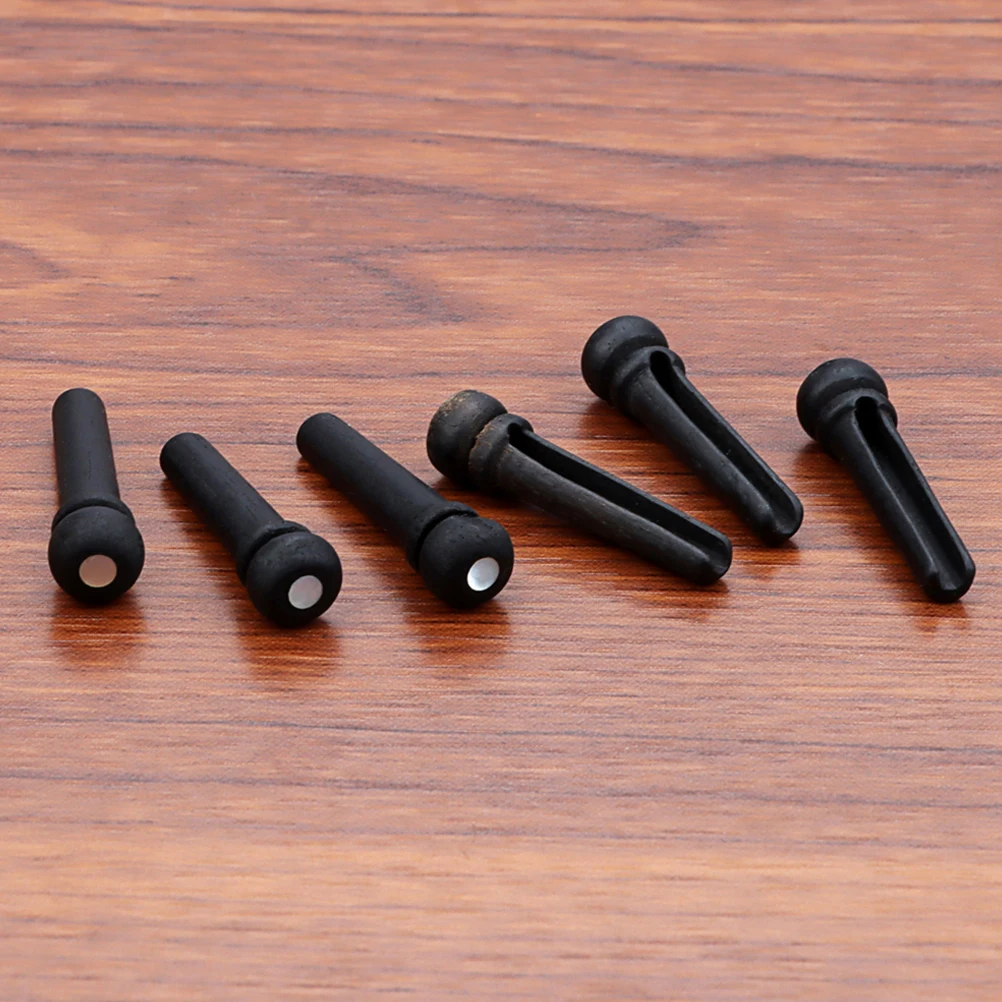6Pcs Guitar Bridge Pin Set Durable Wood Fixed Cones for Acoustic Folk Guitar String Replacement Parts Tuning Pin
6Pcs Guitar Bridge Pin Set Durable Wood Fixed Cones for Acoustic Folk Guitar String Replacement Parts Tuning Pin