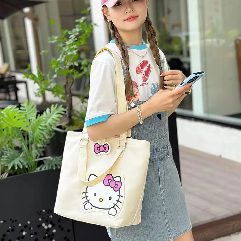 Hello Kitty Cinnamoroll Anime Kawaii Sanrio Canvas Bag Cute My Melody Large Capacity Single Shoulder Handbag Gifts for Girls
Hello Kitty Cinnamoroll Anime Kawaii Sanrio Canvas Bag Cute My Melody Large Capacity Single Shoulder Handbag Gifts for Girls