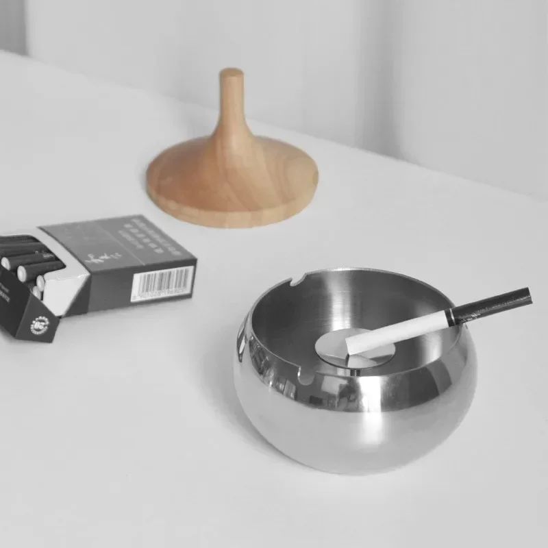 Stainless steel wooden lid ashtray large household living room office ashtray anti fly ash drop thickened silver smoke cup
Stainless steel wooden lid ashtray large household living room office ashtray anti fly ash drop thickened silver smoke cup
