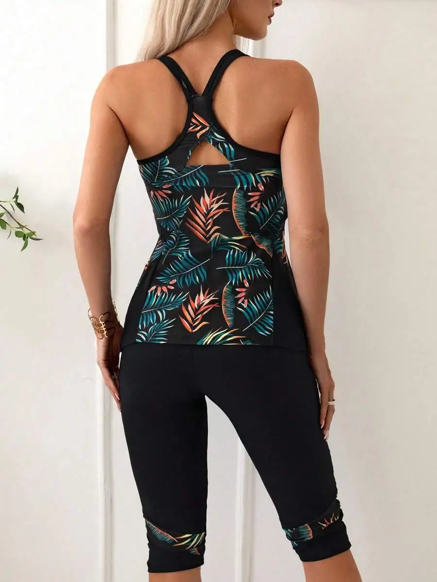 Black Tropical Leaf Print Racerback Crop Top Paired With High-Waisted Capri Leggings Two Piece Set
Black Tropical Leaf Print Racerback Crop Top Paired With High-Waisted Capri Leggings Two Piece Set