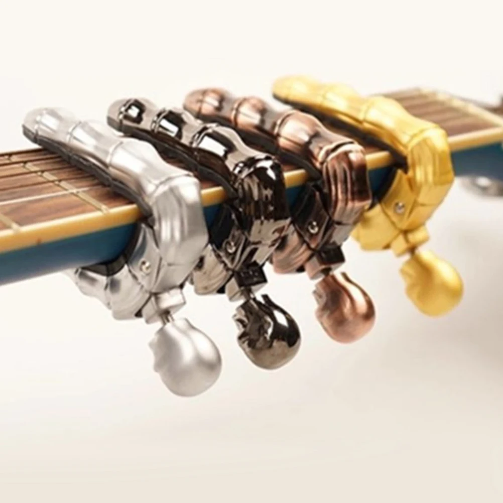 Portable Ukulele Clip-On Tuner Ballad Guitar Capo Electric Guitar Tune Clamp Key Trigger Capo (Bronze)
Portable Ukulele Clip-On Tuner Ballad Guitar Capo Electric Guitar Tune Clamp Key Trigger Capo (Bronze)