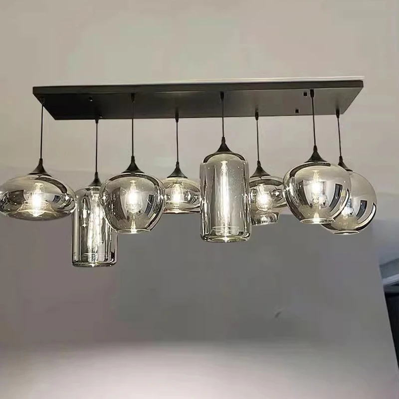 Modern luxury Nordic-style living room and dining room electroplated ash glass island table and pendant lamp
Modern luxury Nordic-style living room and dining room electroplated ash glass island table and pendant lamp