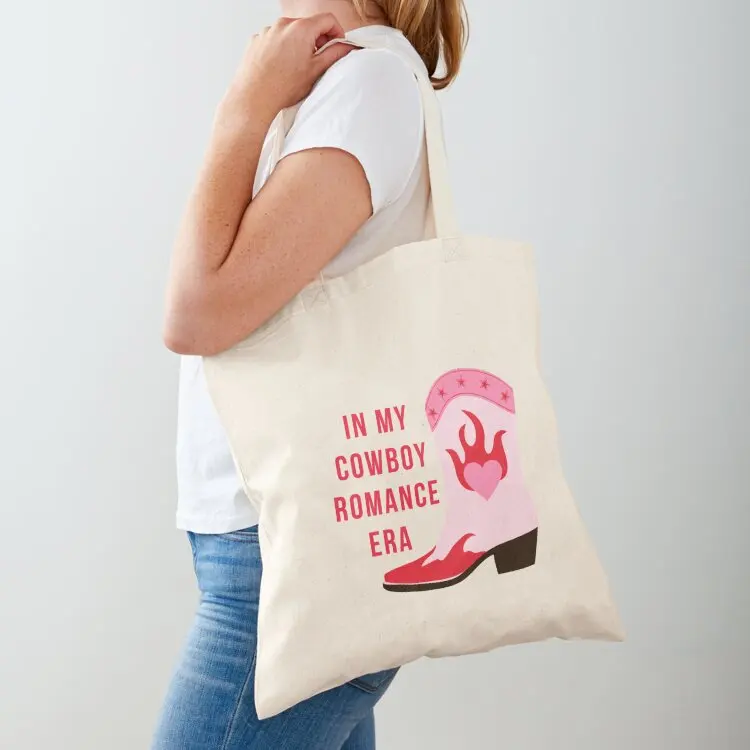 in my cowboy romance era, western romance novel, cowgirl boots, spicy booktok reader vibes, cowboy book boyfriend Tote Bag
in my cowboy romance era, western romance novel, cowgirl boots, spicy booktok reader vibes, cowboy book boyfriend Tote Bag