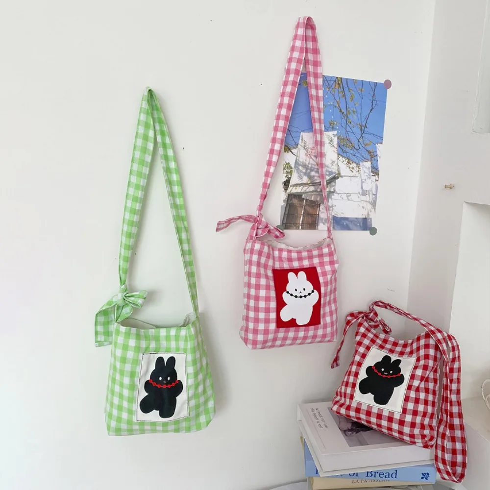 Cartoon Crossbody Cloth Pouch Magnetic Button Embroidered Rabbit Plaid Shoulder Bag Large Capacity Korean Style Canvas Phone Bag
Cartoon Crossbody Cloth Pouch Magnetic Button Embroidered Rabbit Plaid Shoulder Bag Large Capacity Korean Style Canvas Phone Bag