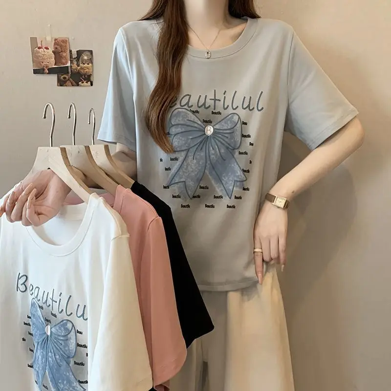 Fashion Bow Printed Pullovers Women's Clothing All-match Round Neck 2025 Summer New Korean Short Sleeve Casual Letter T-shirts
Fashion Bow Printed Pullovers Women's Clothing All-match Round Neck 2025 Summer New Korean Short Sleeve Casual Letter T-shirts