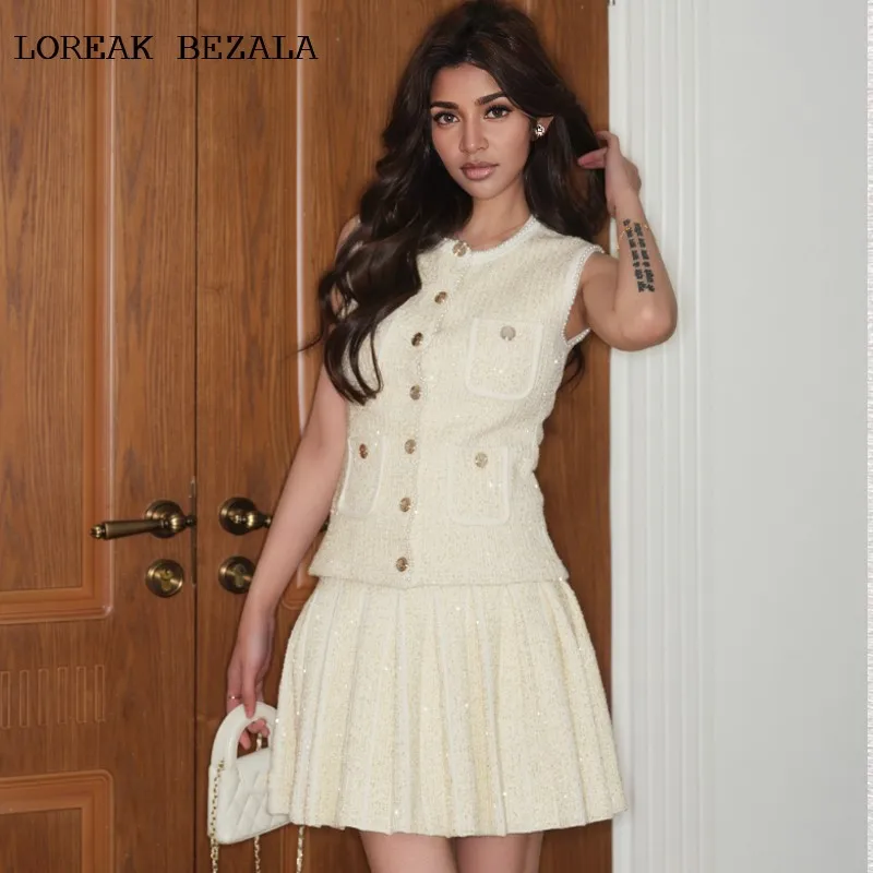 Ladies' Knitted elastic 2-piece Skirt Set Fashionable Spring/Autumn Women's Customized pearl sleeveless vest+pleated skirt set
Ladies' Knitted elastic 2-piece Skirt Set Fashionable Spring/Autumn Women's Customized pearl sleeveless vest+pleated skirt set