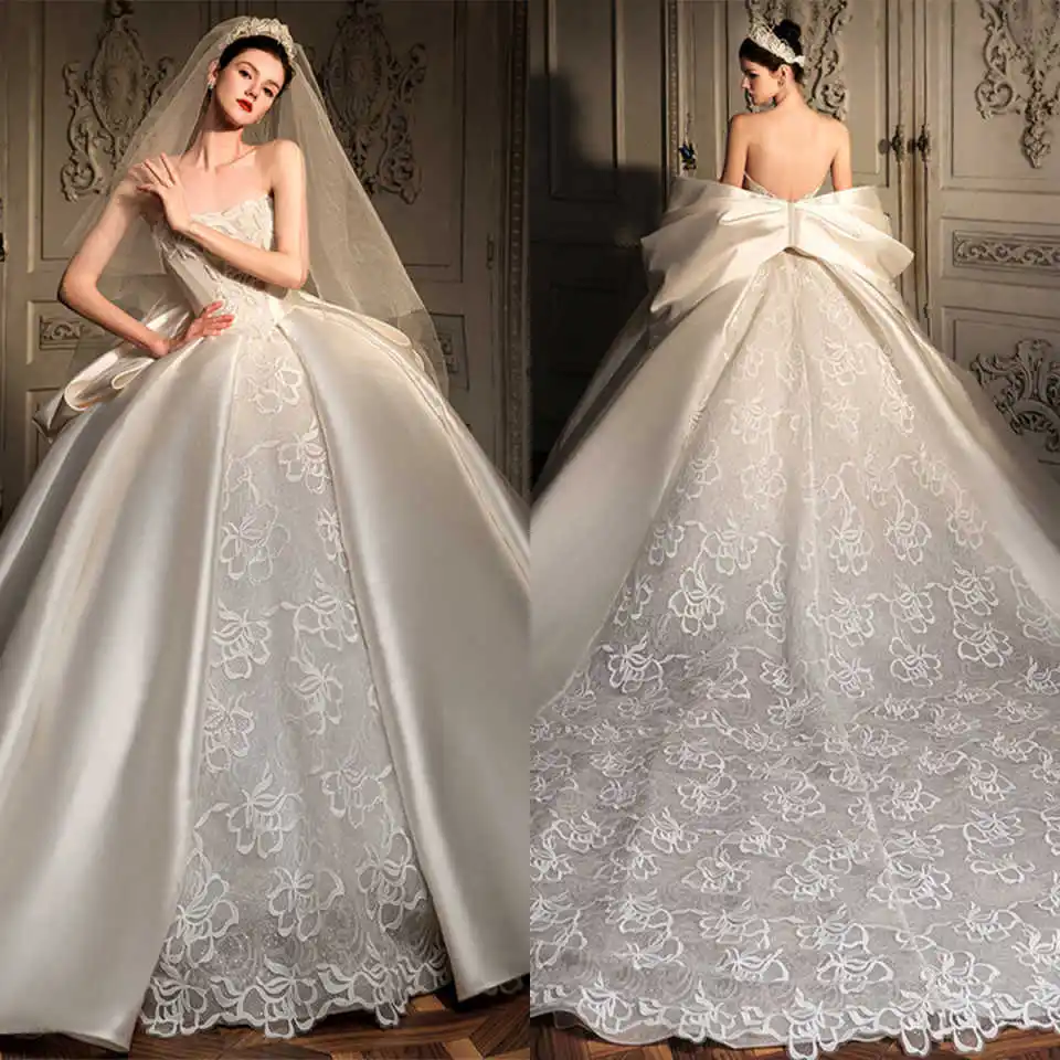 Charming Lace Appliques Bow Ball Gown Bridal Dress Strapless Cathedral Train Satin Wedding Dress Vestido De Novia Customized
Charming Lace Appliques Bow Ball Gown Bridal Dress Strapless Cathedral Train Satin Wedding Dress Vestido De Novia Customized
