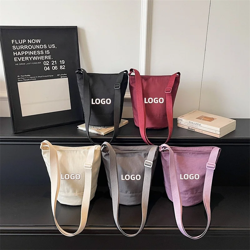 Custom Logo/Design Bucket Tote Bag Adjustable Shoulder Strap Nylon Crossbody Bag Mini Casual Daily Work Shopping Bag for Women
Custom Logo/Design Bucket Tote Bag Adjustable Shoulder Strap Nylon Crossbody Bag Mini Casual Daily Work Shopping Bag for Women