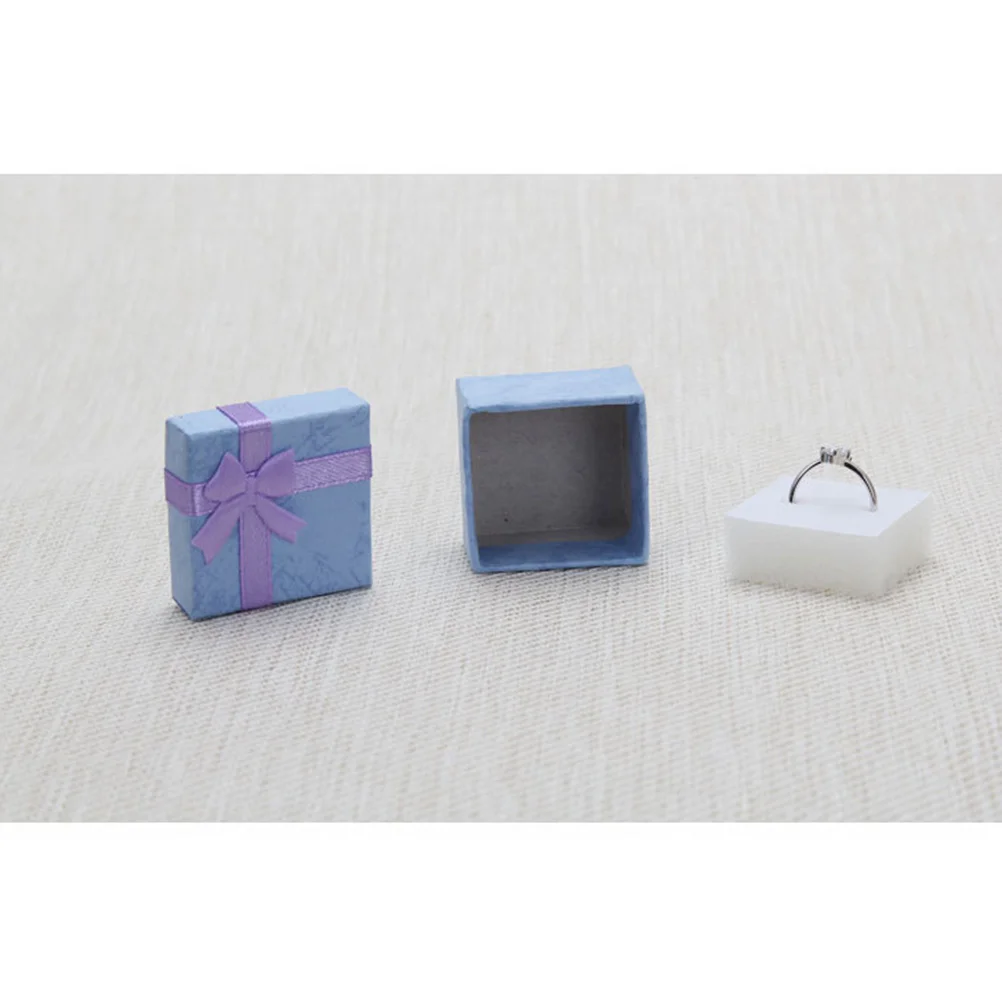 5 шт. фиолетовых подарочных коробок для ювелирных изделий, маленькие бумажные коробки для колец с бантом, элегантные футляры для хранения и демонстрации
5 шт. фиолетовых подарочных коробок для ювелирных изделий, маленькие бумажные коробки для колец с бантом, элегантные футляры для хранения и демонстрации