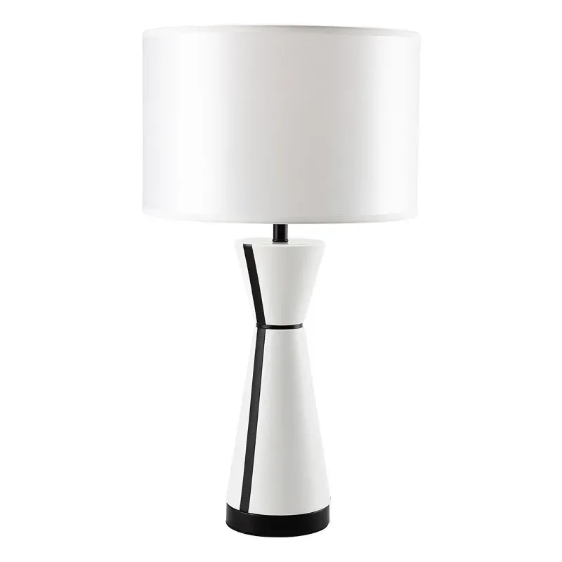 American simple light luxury leather table bedside modern art table lamp designer
American simple light luxury leather table bedside modern art table lamp designer