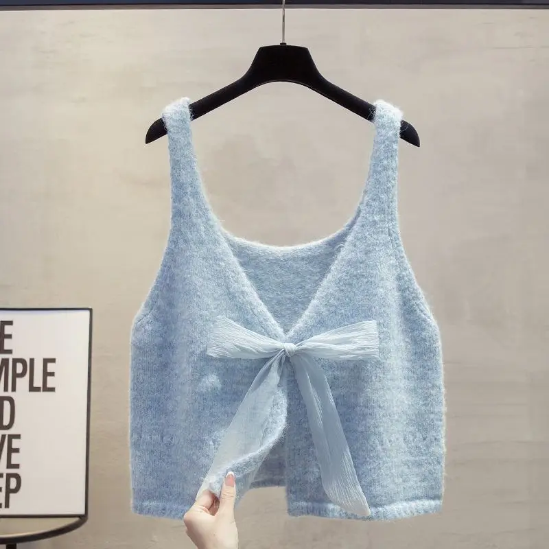 Solid Color Sweater Vest Women's Clothing Sleeveless Loose Jumper V-neck Sweet Bow Waistcoat Crop Tops Fashion Knitting Tanks
Solid Color Sweater Vest Women's Clothing Sleeveless Loose Jumper V-neck Sweet Bow Waistcoat Crop Tops Fashion Knitting Tanks