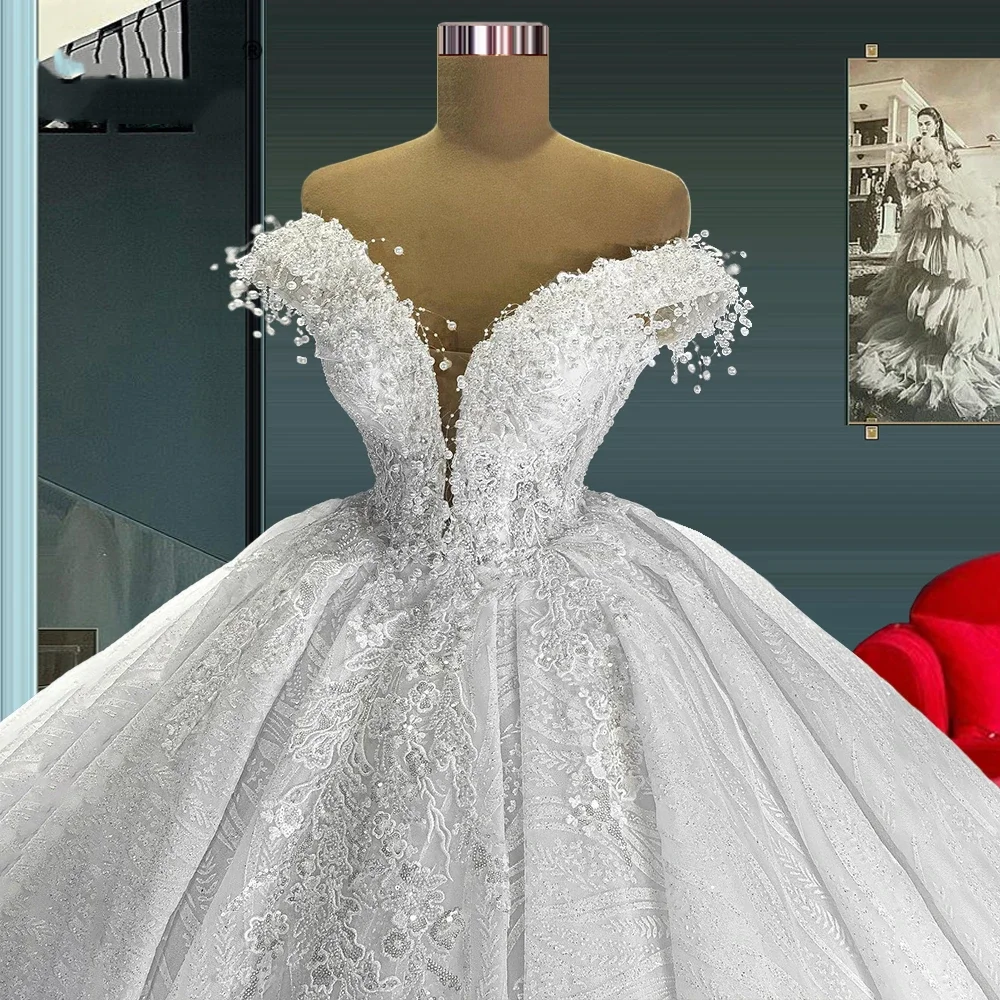 Свадебные платья с открытыми плечами и кружевом, белые бальные платья принцессы, свадебные платья с аппликациями, расшитые бисером и жемчугом, 2026, на заказ
Свадебные платья с открытыми плечами и кружевом, белые бальные платья принцессы, свадебные платья с аппликациями, расшитые бисером и жемчугом, 2026, на заказ