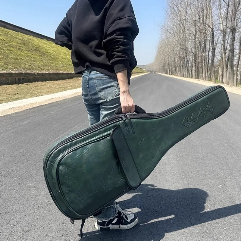 41-дюймовый кожаный рюкзак для гитары, водонепроницаемый, с утолщенной подкладкой, дышащий, портативный, на плечо, сумка для гитары, аксессуар для музыкального инструмента
41-дюймовый кожаный рюкзак для гитары, водонепроницаемый, с утолщенной подкладкой, дышащий, портативный, на плечо, сумка для гитары, аксессуар для музыкального инструмента