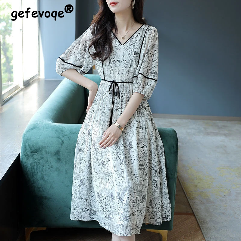 Women New Summer Floral Print Lace Up Vintage Elegant Chiffon Dresses Korean Fashion Casual V Neck Short Sleeve Loose Midi Dress
Women New Summer Floral Print Lace Up Vintage Elegant Chiffon Dresses Korean Fashion Casual V Neck Short Sleeve Loose Midi Dress