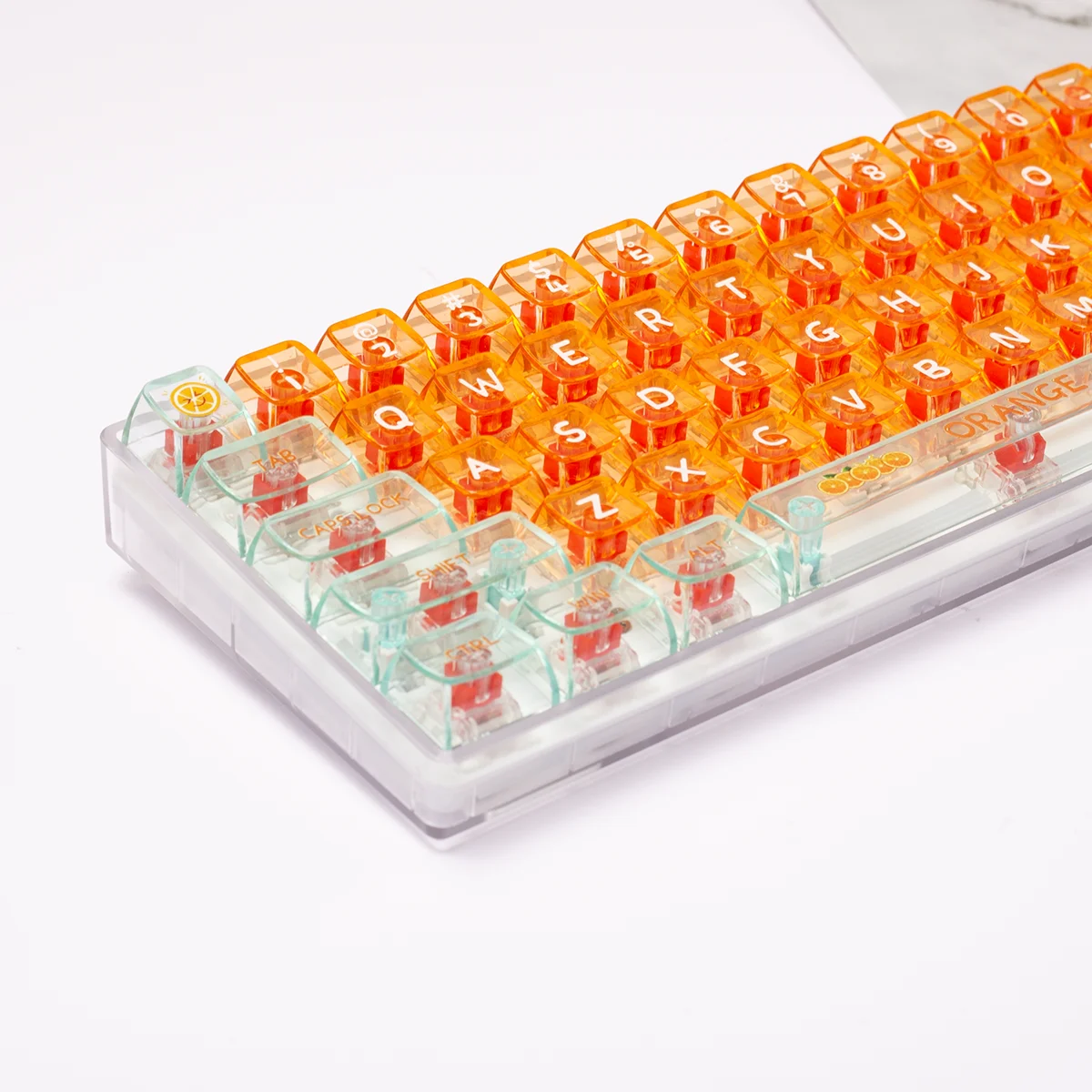 Yuanqi orange keycap fresh orange ice crystal transparent PC material 132 key small full set of boneless position adapted to mec
Yuanqi orange keycap fresh orange ice crystal transparent PC material 132 key small full set of boneless position adapted to mec
