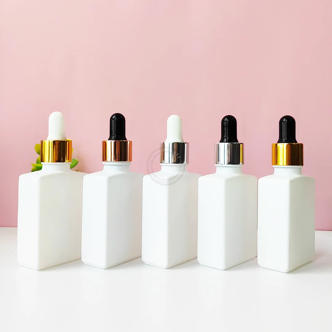 Wholesale 30ml Matte White Rectangle Eye Drop Pipette Bottle with Gold Silver Rose Gold Cap for Beard Oils Hair Serum E Juice CN
Wholesale 30ml Matte White Rectangle Eye Drop Pipette Bottle with Gold Silver Rose Gold Cap for Beard Oils Hair Serum E Juice CN