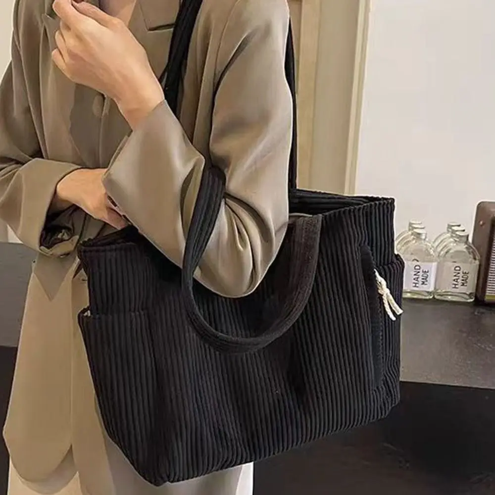 Corduroy Women's Shopper Tote Bag Solid Color Multiple Pockets Corduroy Shoulder Bag Casual Large Capacity Shopping Handbags
Corduroy Women's Shopper Tote Bag Solid Color Multiple Pockets Corduroy Shoulder Bag Casual Large Capacity Shopping Handbags