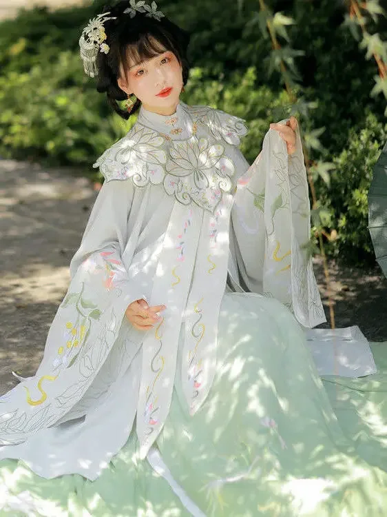 Женская рубашка Hanfu с длинными рукавами и воротником-стойкой династии Мин, древняя плиссированная юбка в китайском стиле
Женская рубашка Hanfu с длинными рукавами и воротником-стойкой династии Мин, древняя плиссированная юбка в китайском стиле
