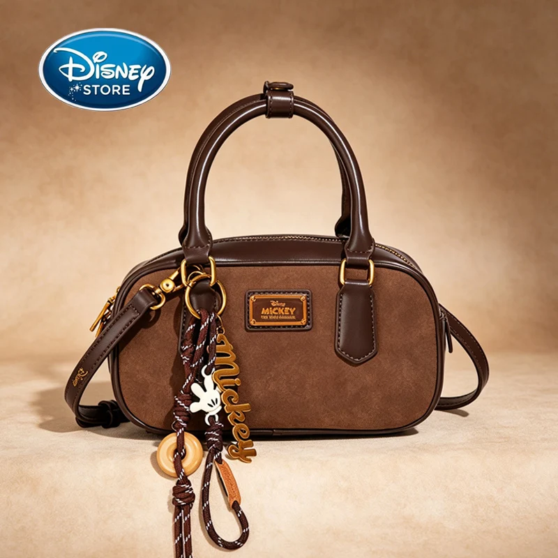 Disney Mickey Retro Boston Crossbody Bag Women's Small Satchel With Mickey Charm Brown Suede & Leather
Disney Mickey Retro Boston Crossbody Bag Women's Small Satchel With Mickey Charm Brown Suede & Leather