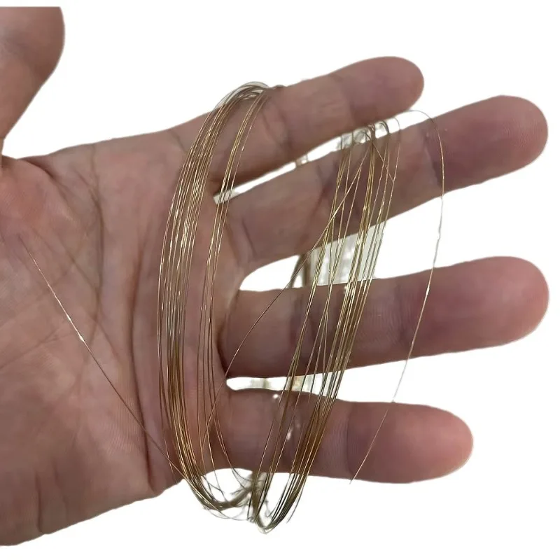 AU750 real gold 18K color retention silk thread DIY handmade necklace pearl bracelet semi-hard wire gold thread
AU750 real gold 18K color retention silk thread DIY handmade necklace pearl bracelet semi-hard wire gold thread
