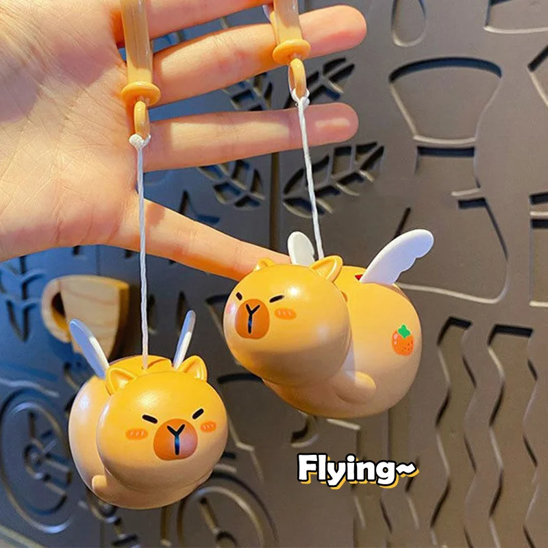 Whimsical Pull-String Flying Capybara Pig Keychain; Toy Pendant Charms for Car Keys; Decompression Toy Gift
Whimsical Pull-String Flying Capybara Pig Keychain; Toy Pendant Charms for Car Keys; Decompression Toy Gift