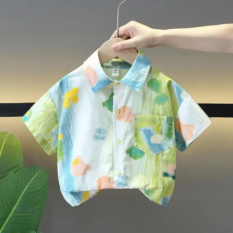 Boys' summer floral shirts, children's summer short sleeves, pure cotton thin styles, breathable mid to small children's summer 
Boys' summer floral shirts, children's summer short sleeves, pure cotton thin styles, breathable mid to small children's summer