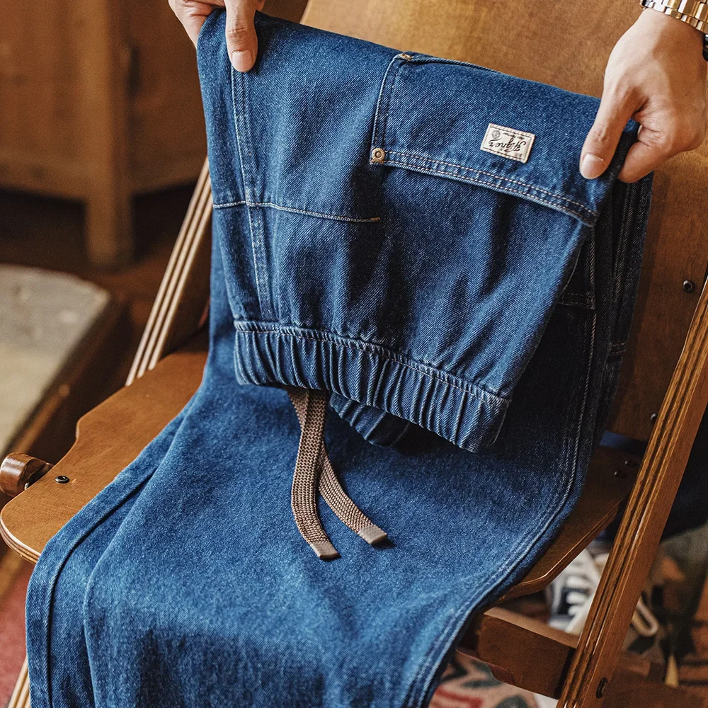 Свободные джинсы Maden в стиле ретро, тяжелые потертые джинсы с карманами, брюки с эластичной резинкой на талии и шнурком, повседневные весенне-осенние брюки 
Свободные джинсы Maden в стиле ретро, тяжелые потертые джинсы с карманами, брюки с эластичной резинкой на талии и шнурком, повседневные весенне-осенние брюки