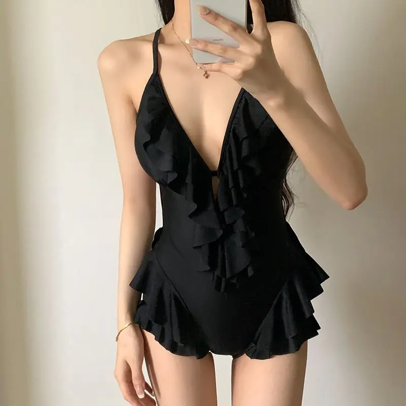 Korean Style Black One Piece Swimsuit Women Deep V Monokini with Ruffle Push Up Padding Backness Bikini for Beach Vacations Pool
Korean Style Black One Piece Swimsuit Women Deep V Monokini with Ruffle Push Up Padding Backness Bikini for Beach Vacations Pool