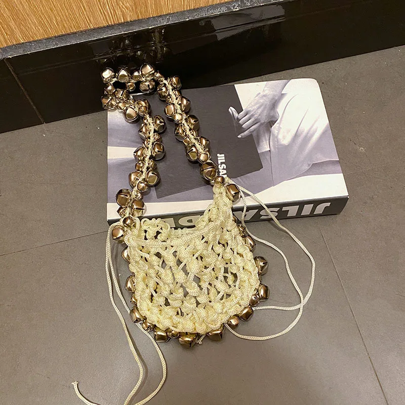 Small Bell Shoulder Bag Hollow Woven Bags for Women Rope Fishing Net Handbags and Purses Luxury Designer Drawstring Bag Flap NEW
Small Bell Shoulder Bag Hollow Woven Bags for Women Rope Fishing Net Handbags and Purses Luxury Designer Drawstring Bag Flap NEW