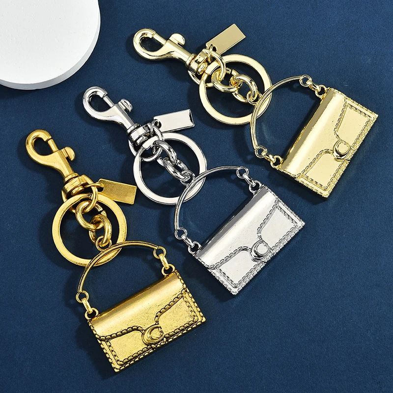Fashion Exquisite Mini Handbag Shape Key Chain Bag Pendant Metal Car Keychain Backpack Decoration Accessories Gifts
Fashion Exquisite Mini Handbag Shape Key Chain Bag Pendant Metal Car Keychain Backpack Decoration Accessories Gifts