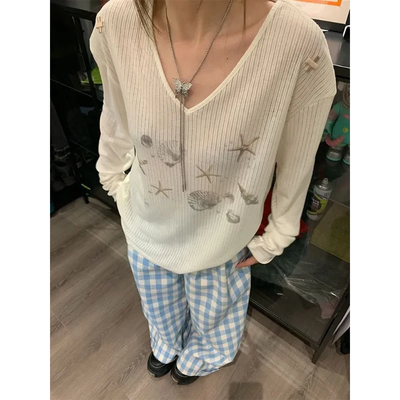 Women's V Neck Ribbed Knit Top Sheer Long Sleeve T-shirt with Starfish Shell Print Casual Loose Fit Blouse
Women's V Neck Ribbed Knit Top Sheer Long Sleeve T-shirt with Starfish Shell Print Casual Loose Fit Blouse