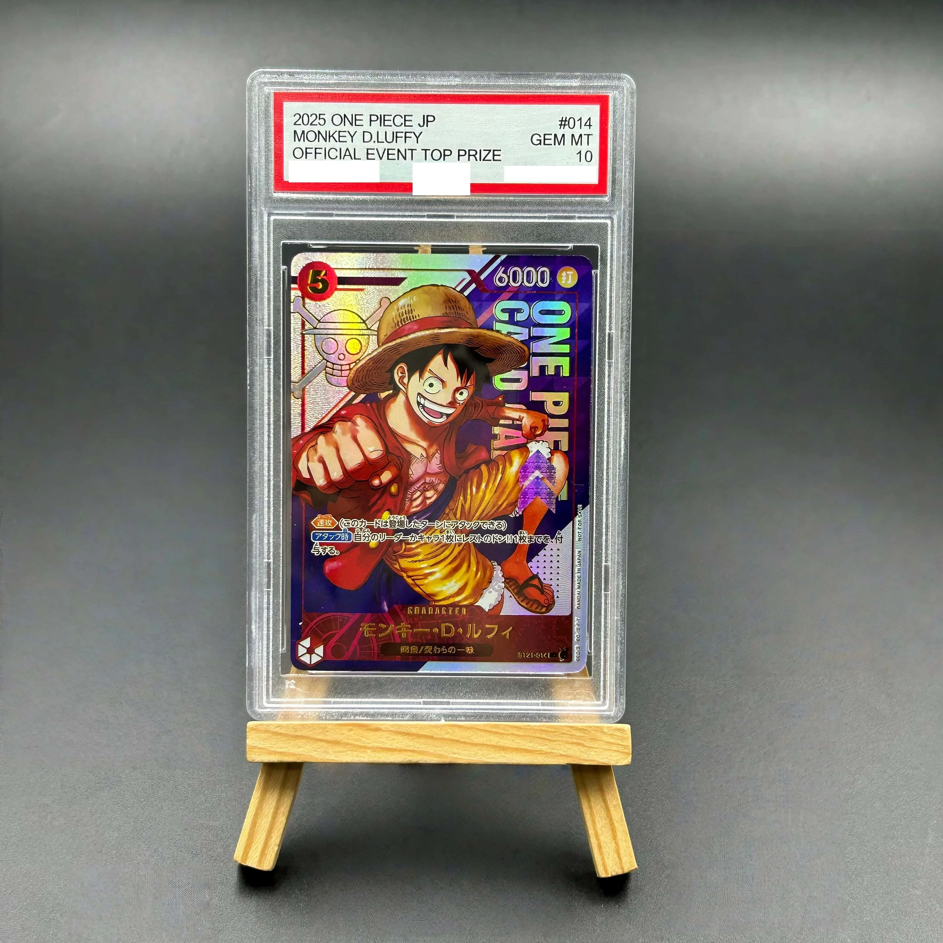 2025 One Piece TCG Japanese Monkey D. Luffy #014 Official Event Top Prize Textured Holo Gem MT 10 Collectible Card
2025 One Piece TCG Japanese Monkey D. Luffy #014 Official Event Top Prize Textured Holo Gem MT 10 Collectible Card