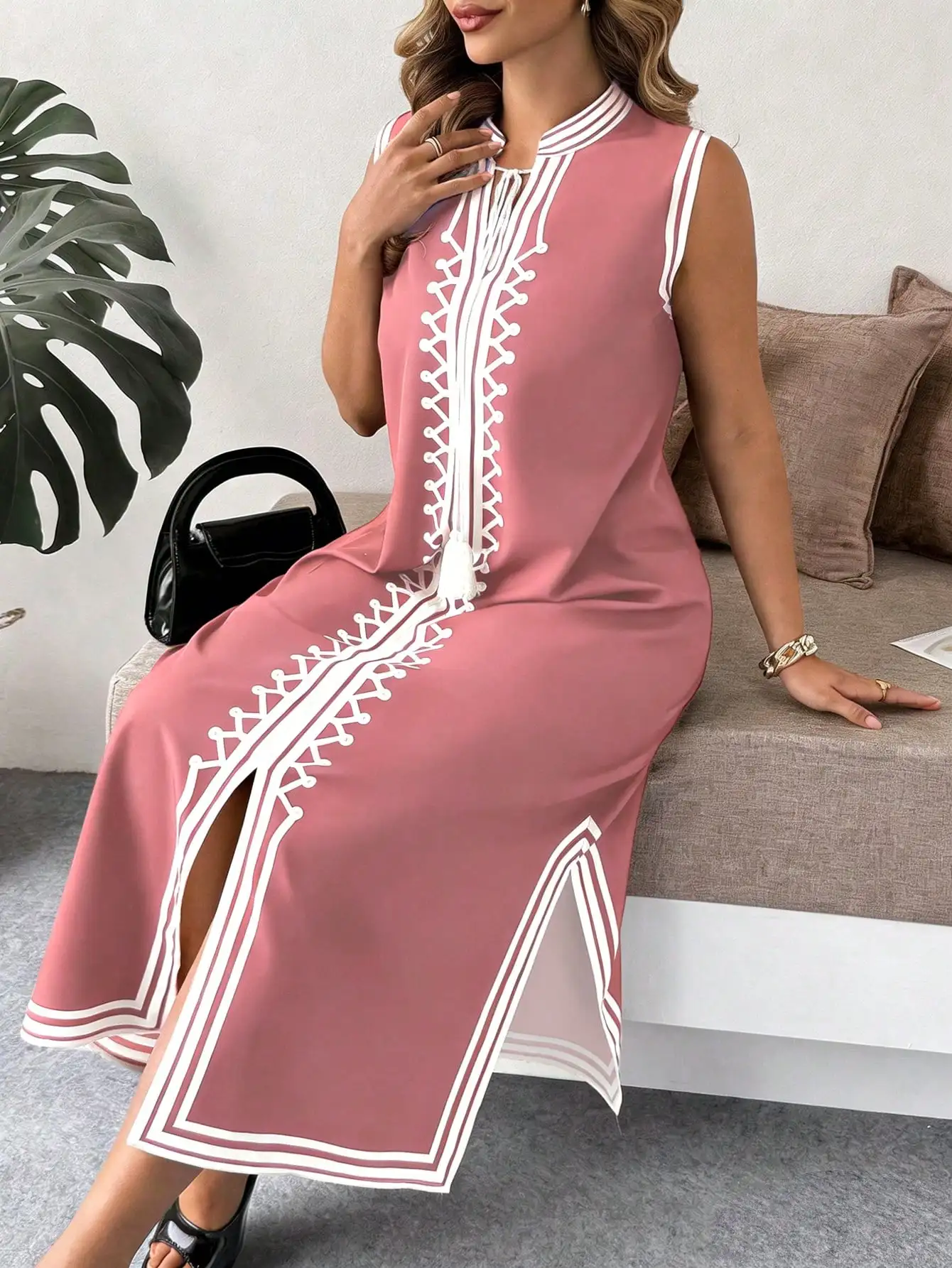 Sleeveless Mandarin Collar Long Dress With Geometric Embroidery And Side Slit
Sleeveless Mandarin Collar Long Dress With Geometric Embroidery And Side Slit